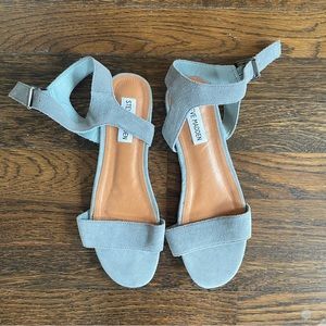 Steve Madden’s Light Blue Cache Suede Flat Sandals